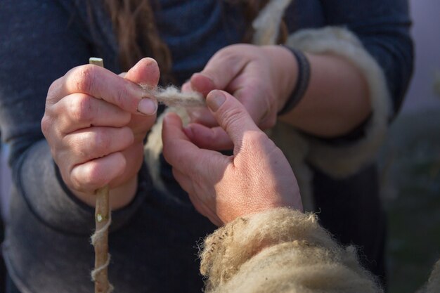 The hands that spin wool fleece by hand