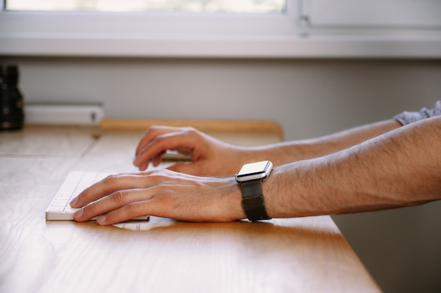 Photo hands typing on a computer keyboard