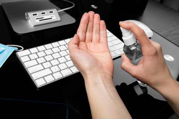 Hands using sanitizer to keep hygiene