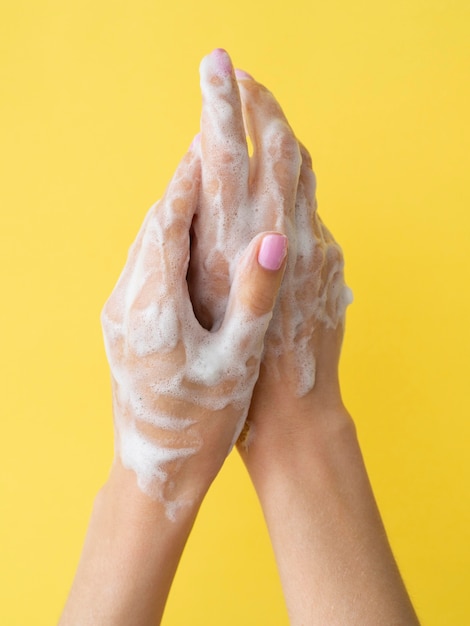 Hands washing with foam and soap