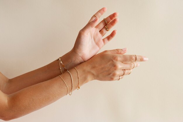 Hands wearing beautiful jewelry