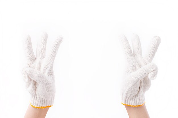 Hands with industrial cotton gloves