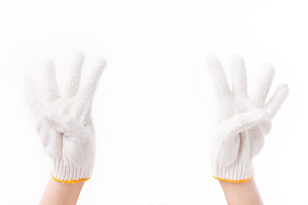 Hands with industrial cotton gloves