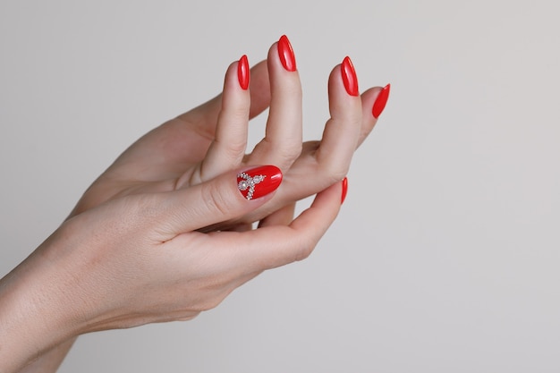 Hands with red manicure