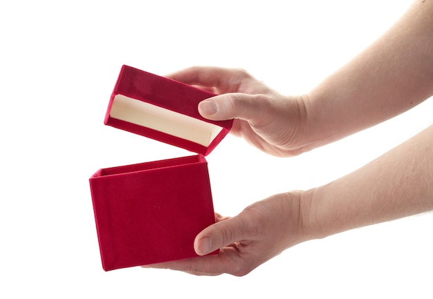 Hands with red open gift box