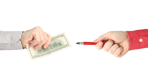 Hands with red pen and money on a white background.