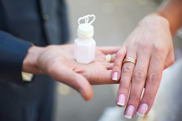 Hands with wedding rings