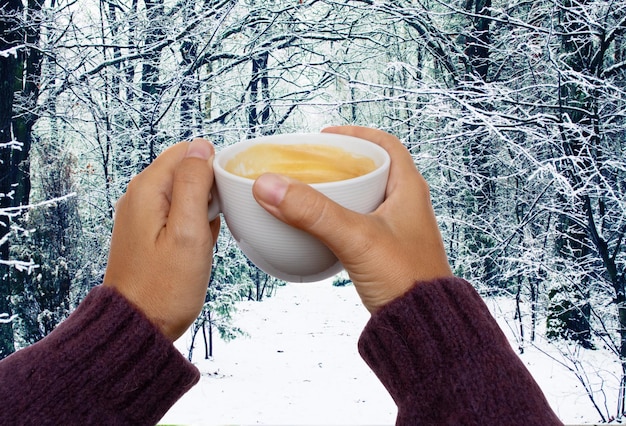 Hands with winter coffee