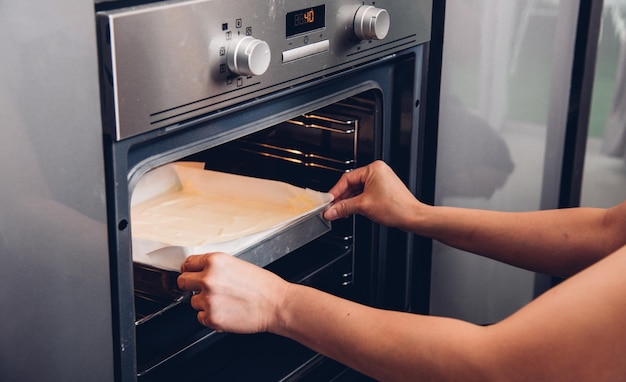 Hands woman female bakery holding bread fresh on front oven