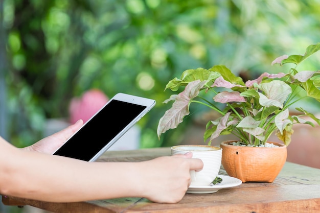 Hands woman using tablet