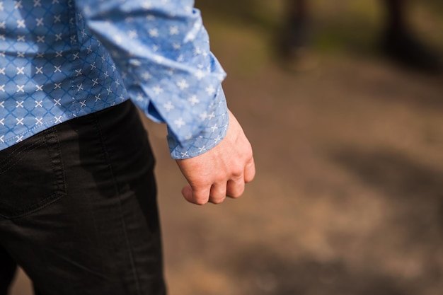 Hands of young people in the nature