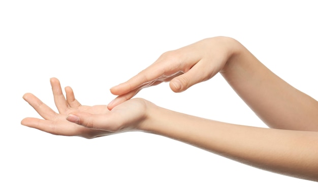 Photo hands of young woman with healthy skin softened by cream with moisturizing effect on white background