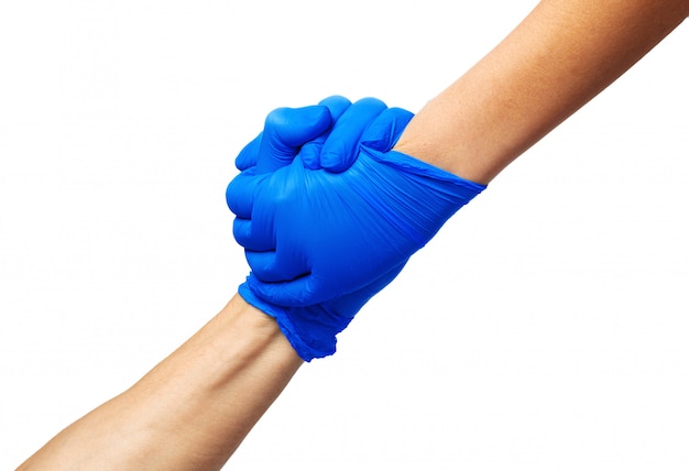 Рукопожатие в голубые перчатки, концепция помощи.