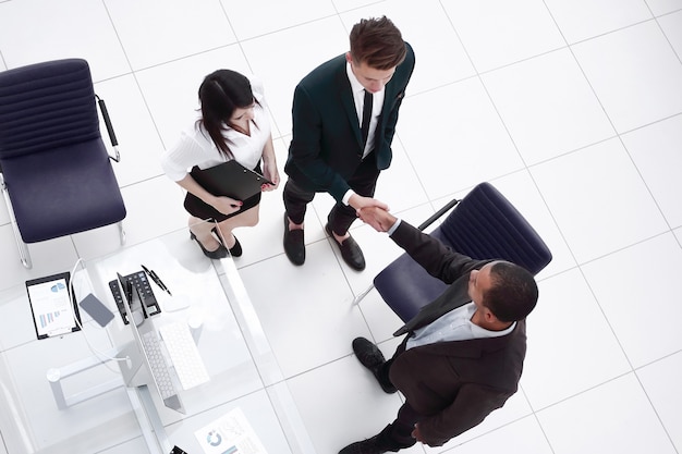 the handshake business partners at a business meeting