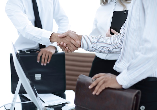 handshake of business people on the of the office