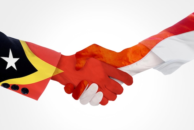 Handshake between Indonesia and East Timor flag