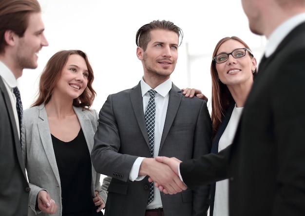 Handshake in the lobby of an office building