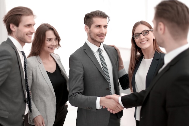 Handshake in the lobby of an office building