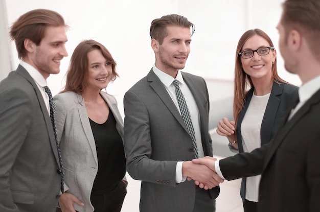 Handshake in the lobby of an office building