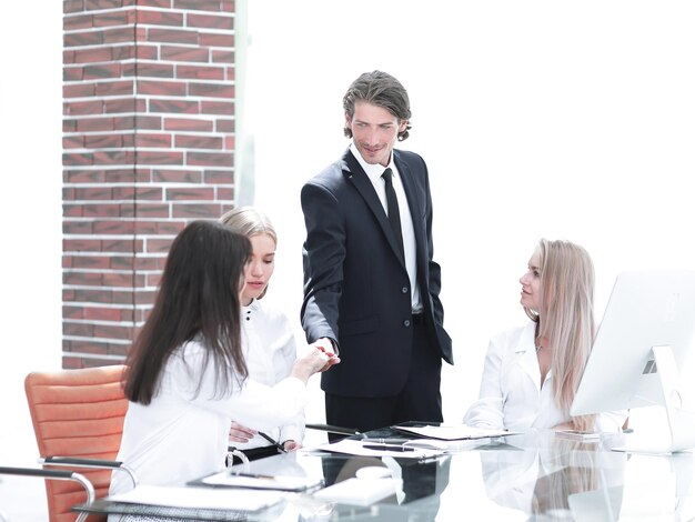 Handshake Manager and customer in a modern office