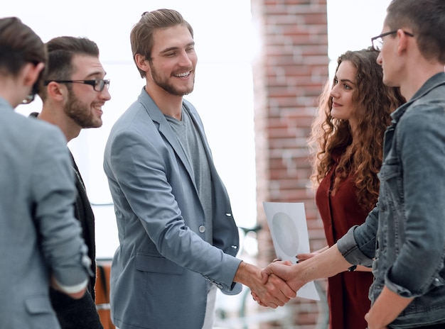 Handshake partners in the creative office