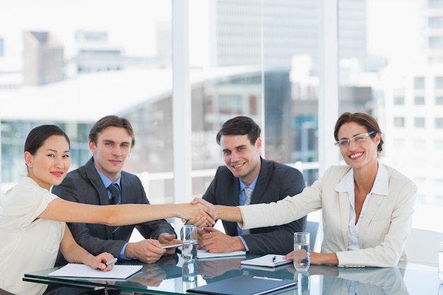 Handshake to seal a deal after a job recruitment meeting