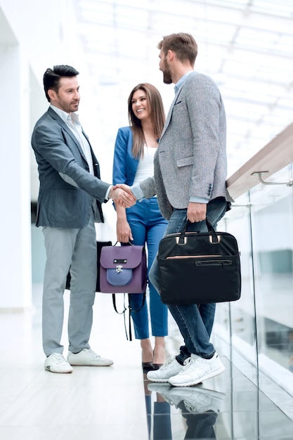 Handshake of the staff of the business centre