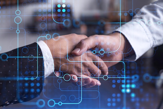 Handshake of two businesspeople as agreement concept to develop a new software to improve service at a company Technological icons Woman in business