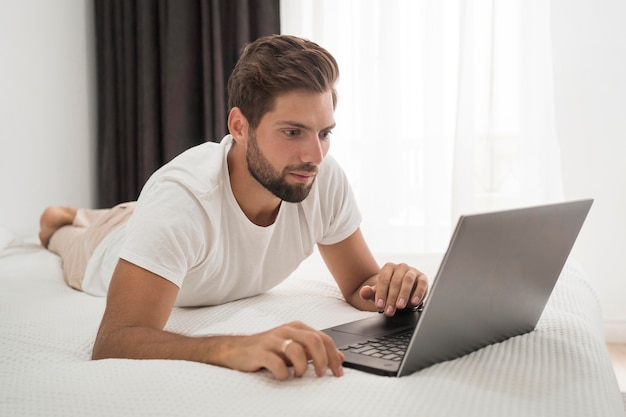 Handsome adult male working from home