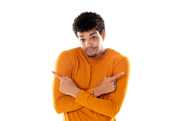 Handsome afro guy pointing to different directions isolated on a white background