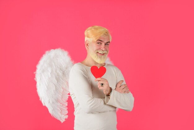 Handsome angel cupid valentines day angel man with white wings love concept valentine angel bearded