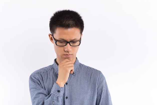 Handsome Asian male in front of white background