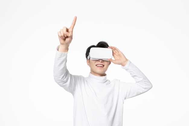 Handsome Asian man with VR glasses