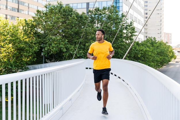 Handsome athletic african man training outdoors