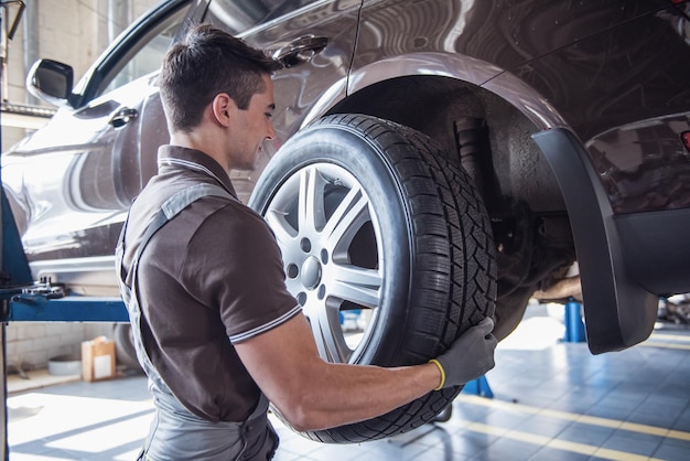 Handsome auto service worker