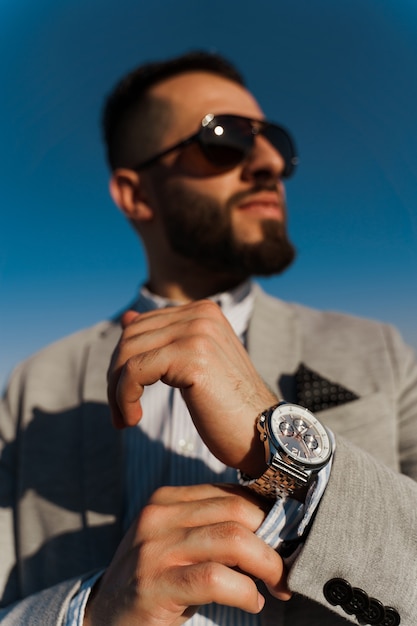 Handsome bearded arabian man in sunglasses. Confident muslim business man. 