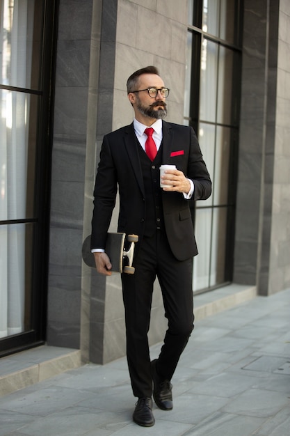 Handsome bearded brunette man in black shirt