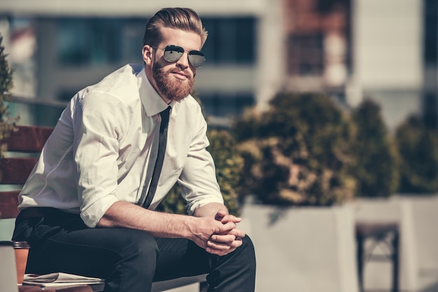 Handsome bearded businessman in classic shirt.