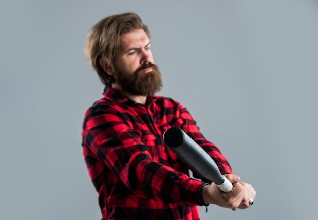 Handsome bearded guy with beard and moustache hold baseball bat brutality