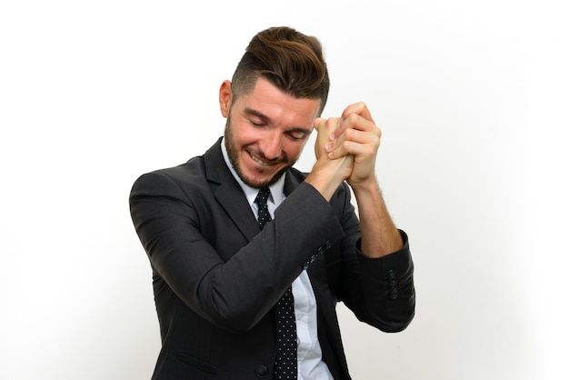 Photo handsome bearded hispanic businessman wearing suit on white