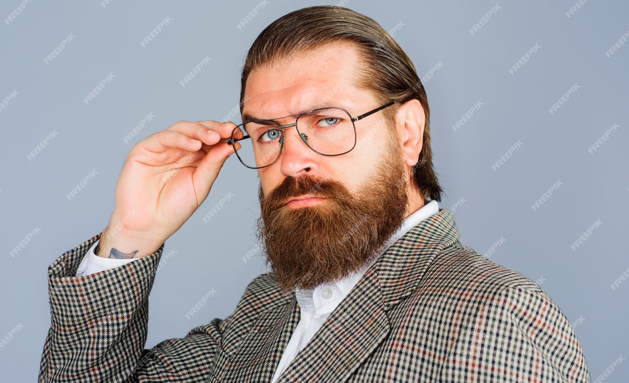 Premium Photo | Handsome bearded man in glasses thoughtful businessman in spectacles male fashion eyewear ads Premium Photo | Handsome bearded man in glasses thoughtful businessman in spectacles male fashion eyewear ads
