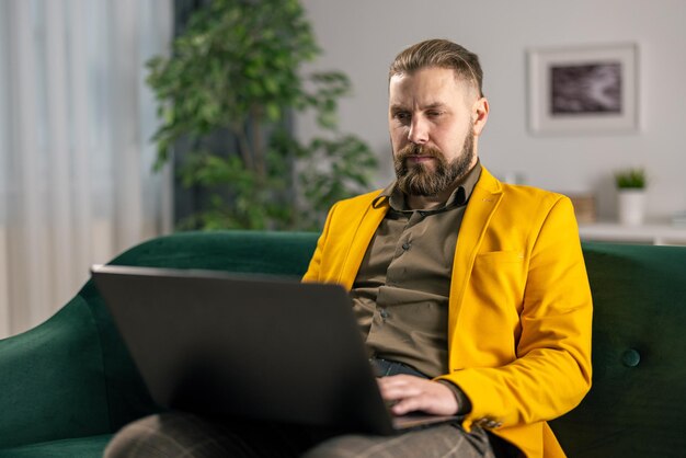 Handsome bearded man in stylish bright