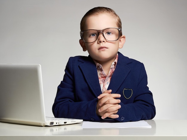 Handsome boy in officebusiness child