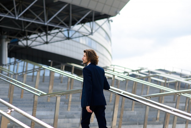 Handsome businessman in the city center