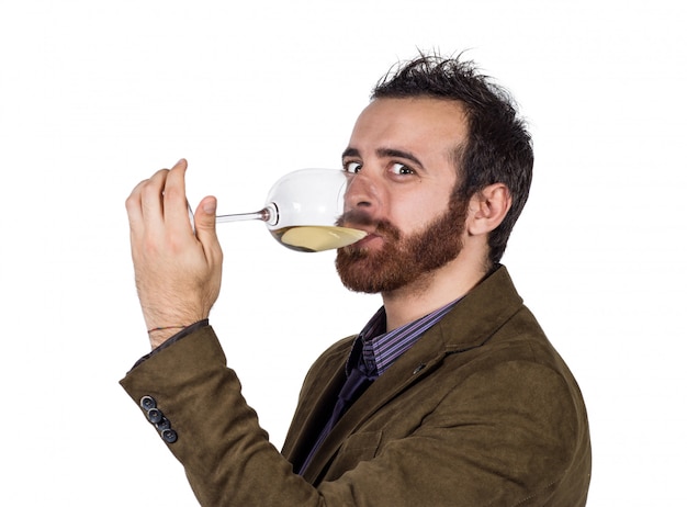 Handsome businessman drinking a glass of wine