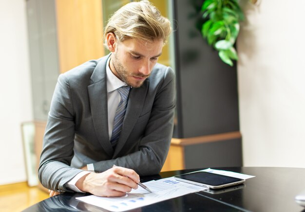 Handsome businessman in his office