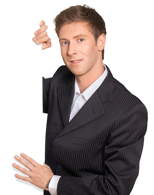 Handsome businessman holding blank sign isolated on white