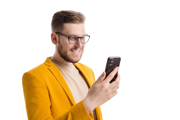 Handsome businessman looking on mobile screen