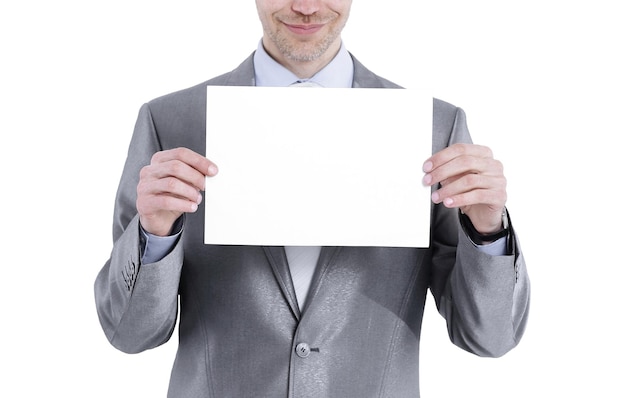 Handsome businessman showing blank sheetisolated on white