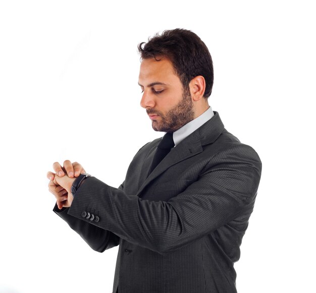 Handsome businessman on white wall